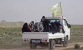 Civilians fleeing Baghuz. (© picture-alliance/dpa)