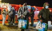 Refugees arriving in Lampedusa. (© picture-alliance/Salvatore Cavalli)