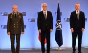 Russia's Deputy Defence Minister Alexander Fomin (left) and Deputy Foreign Minister Alexander Grushko with Nato Secretary General Jens Stoltenberg (right) in Brussels on 12 January. (© picture alliance/dpa/Sputnik/Alexey Vitvitsky)