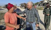 Romanian Defence Minister Angel Tilvar in the Danube Delta on 6 September. (© picture alliance/ASSOCIATED PRESS/Uncredited)