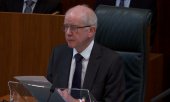 Presiding judge Lord Reed delivers the ruling on 15 November. (© picture-alliance/empics / PA Video)